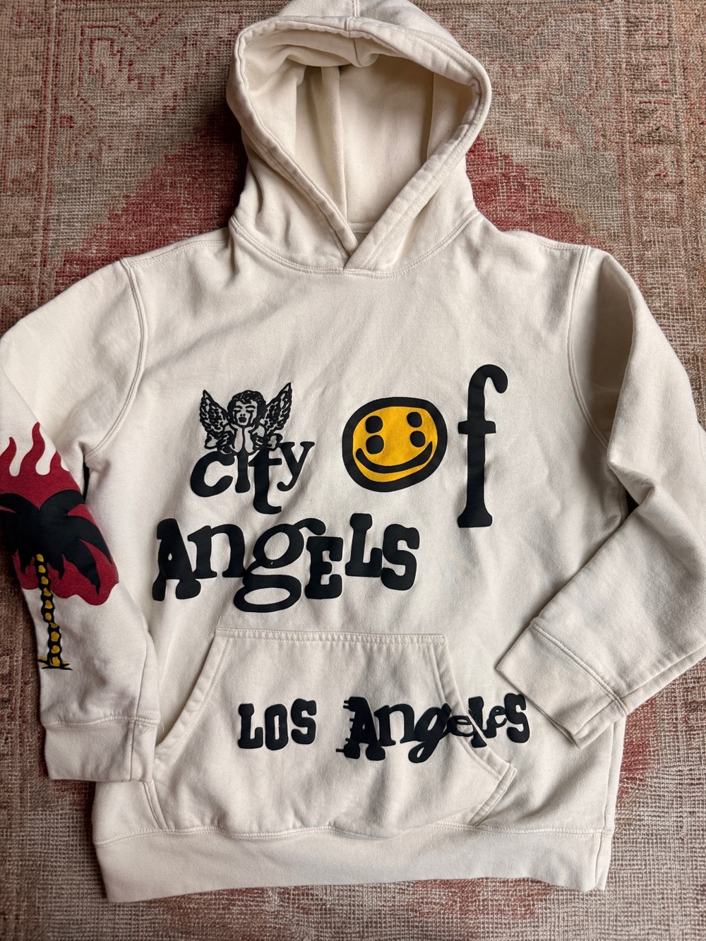 PacSun Cream Hoodie with Black Text and Yellow Smiley Graphic